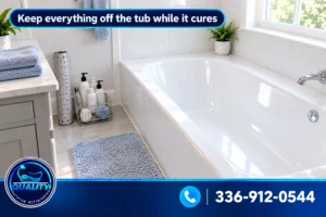 Freshly refinished white bathtub kept clear of toiletries and bath accessories while curing