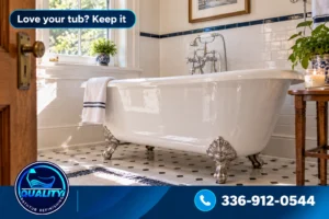 Freshly refinished glossy white cast iron bathtub in a classic North Carolina bathroom